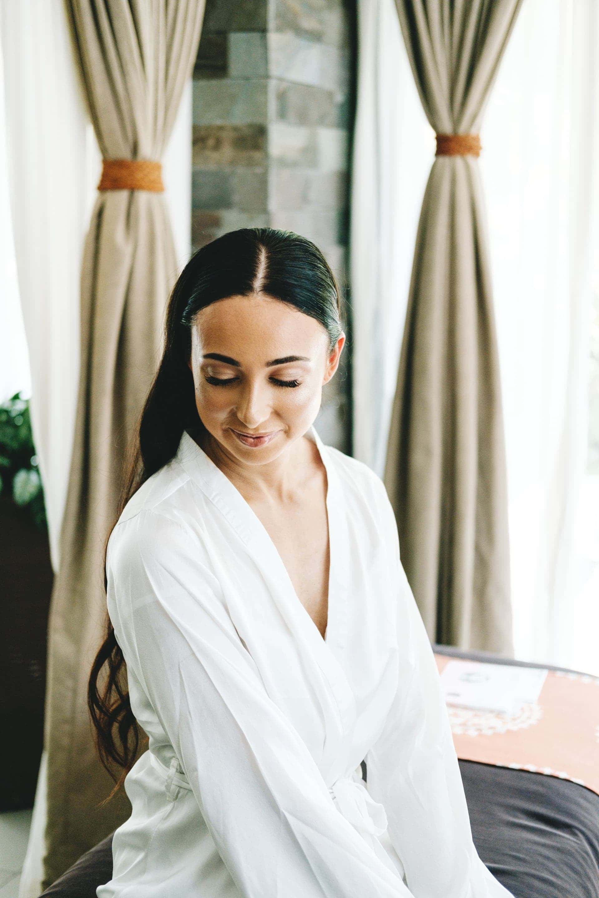 the bride with her hair and makeup completed