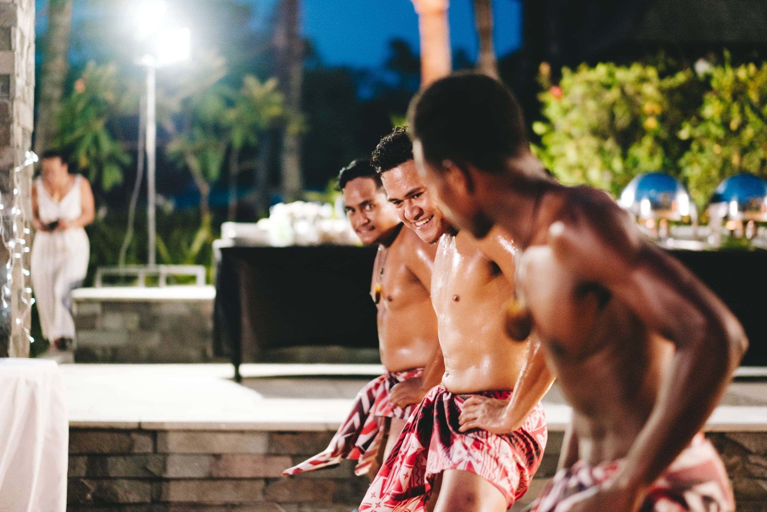 Polynesian dancers preform for the wedding guests