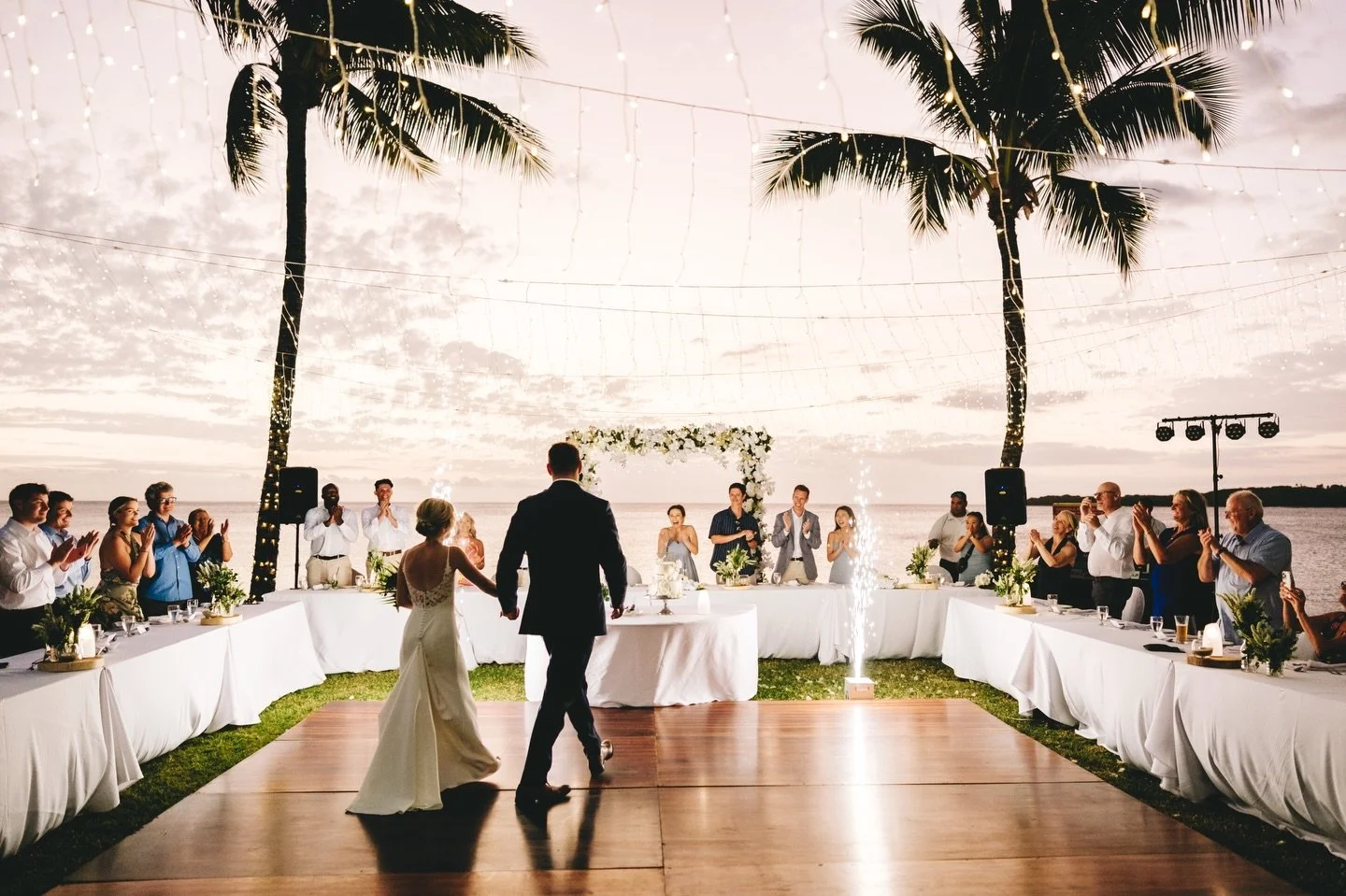 Tropical wedding reception under the stars at the chapel beachfront lawn at the InterContinental Fiji ✨ Photography and video services provided by Nadi Bay for the lovely couple, and the other fab Fiji vendors who contributed to making this an amazin