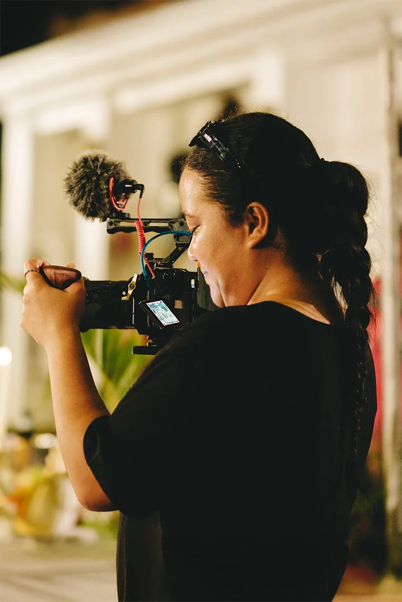 Lysa our wedding videographer shooting a wedding reception with a handheld camera rig