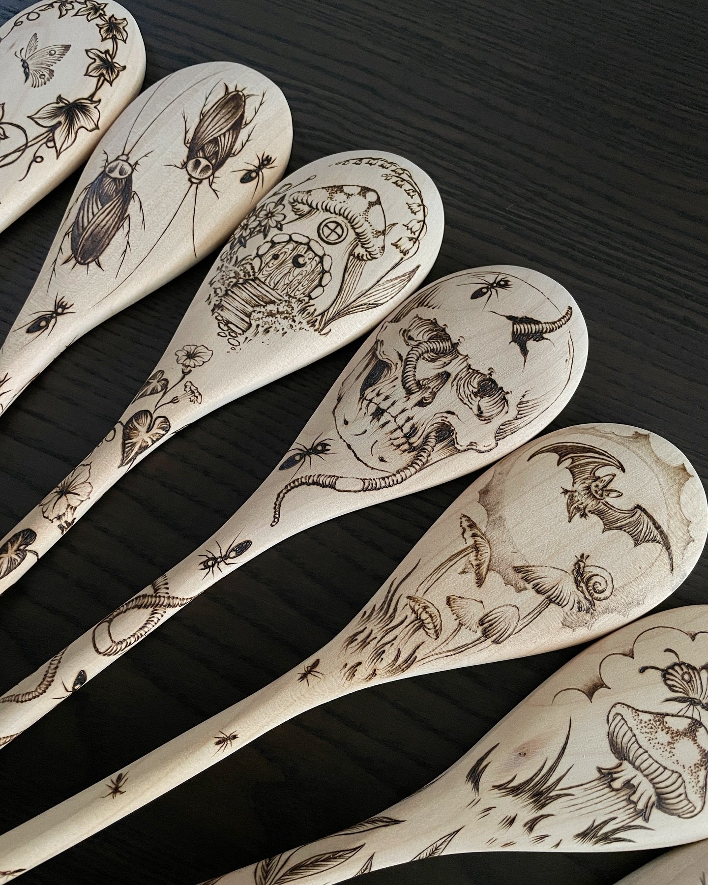 next batch of spoons ready for finishing, preparing for the @marketofthemacabre this Saturday September 14th inside @laurelhillphl 🪦 each spoon is sanded, wiped down with a damp cloth and sanded again before i start. then i hand draw the designs dir