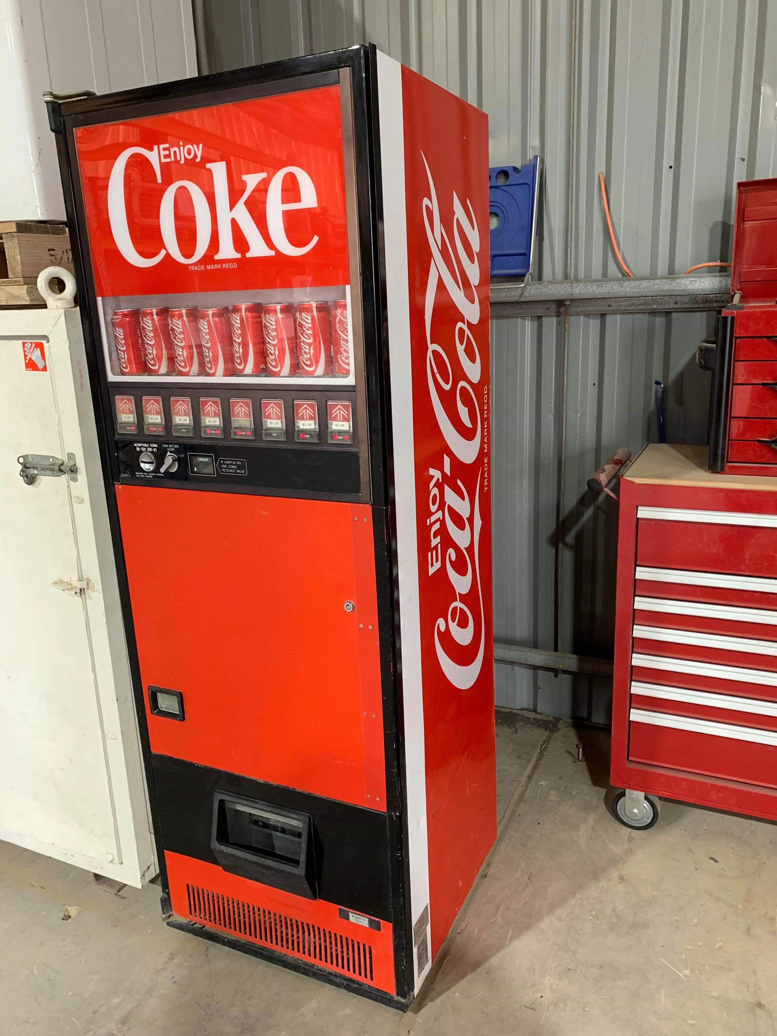 The dilapidated coke machine that Kane found and restored for another avenue to raise money for the babies of Bhutan.