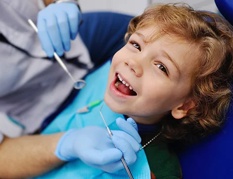 kid-smiling-dentist.jpg
