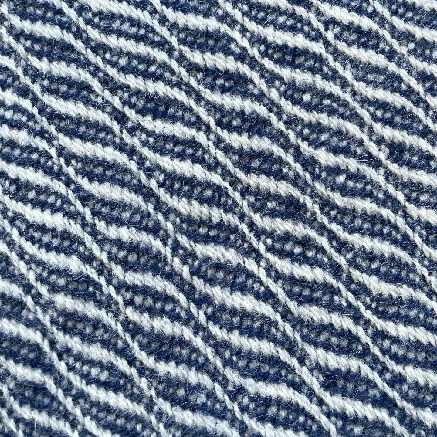 Relaxing for a moment with a favourite blue and white cushion, handwoven in pure wool by me in the studio. I've done a little shop update online and my last posting day before the break will be Thursday 18th if you've got your eye on something.

#int