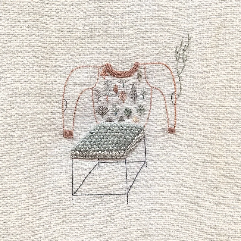 Chair with pale forest sweater.jpg