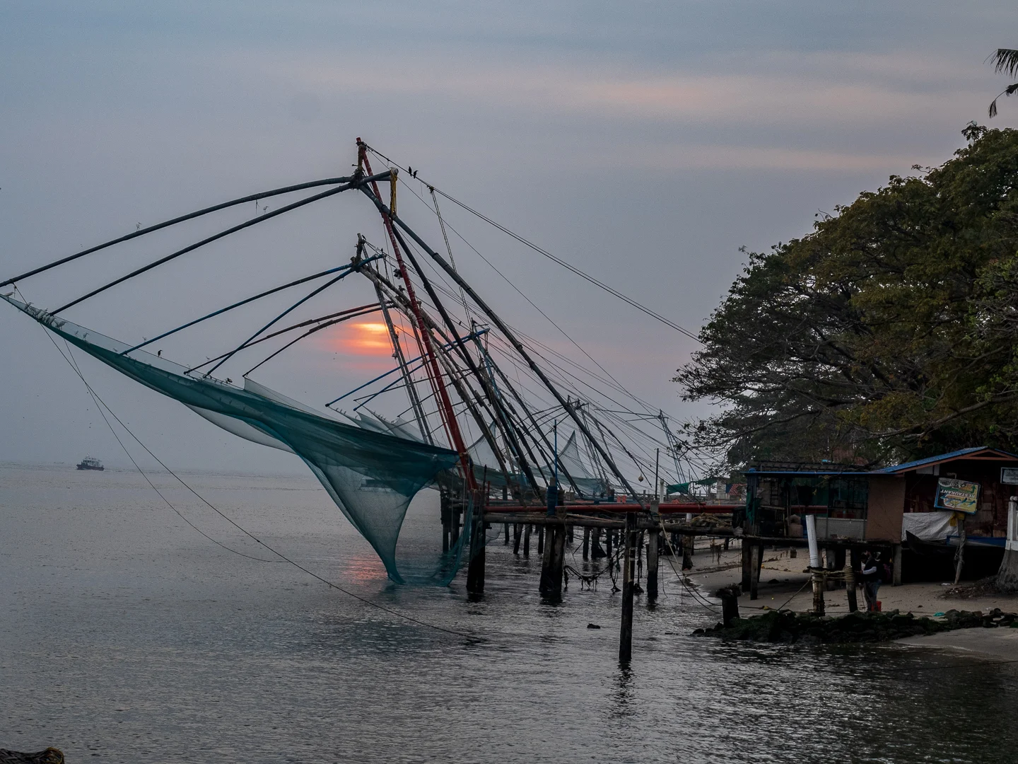 Chinese fishing nets at sunset in Cochin harbor