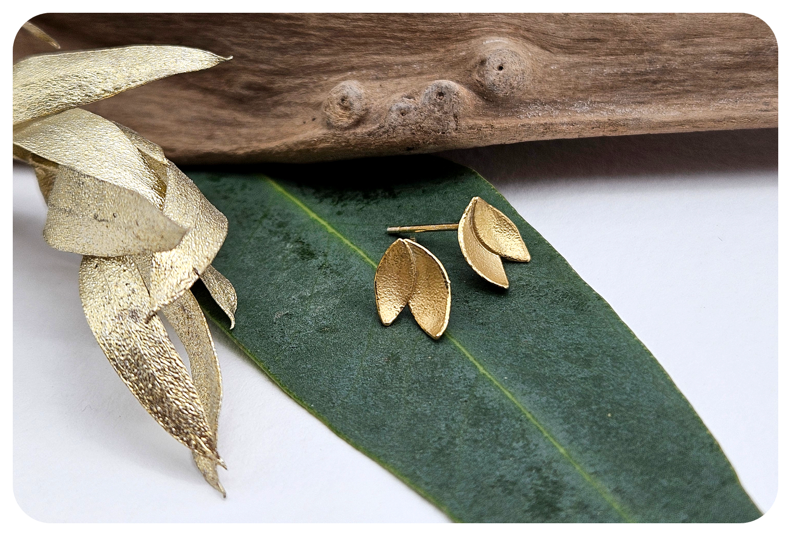 small gold euc petal ear.png