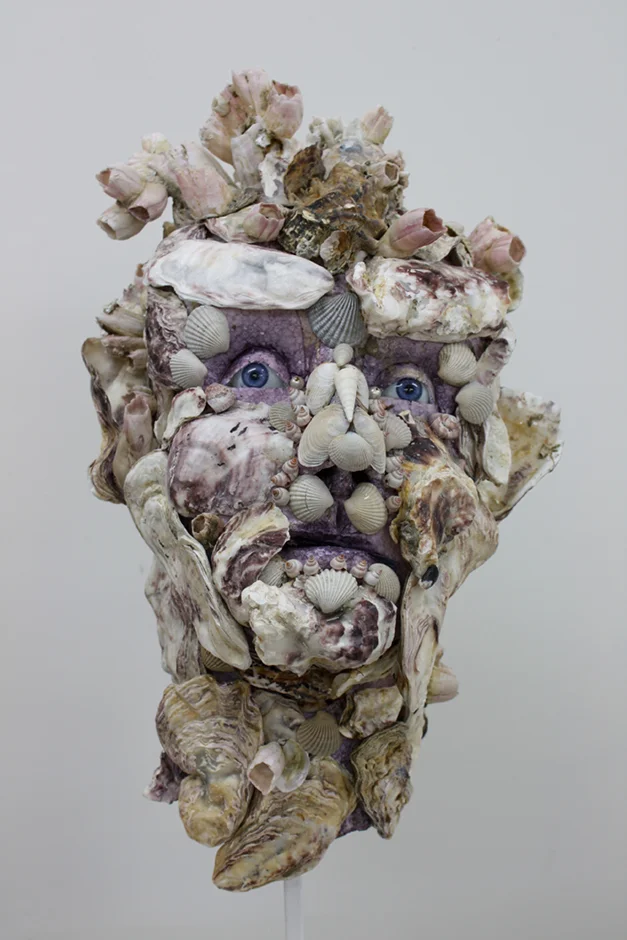 Sad-eyed Oyster Man 2010 Shell, polystyrene, glass eyes, wig, steel stand