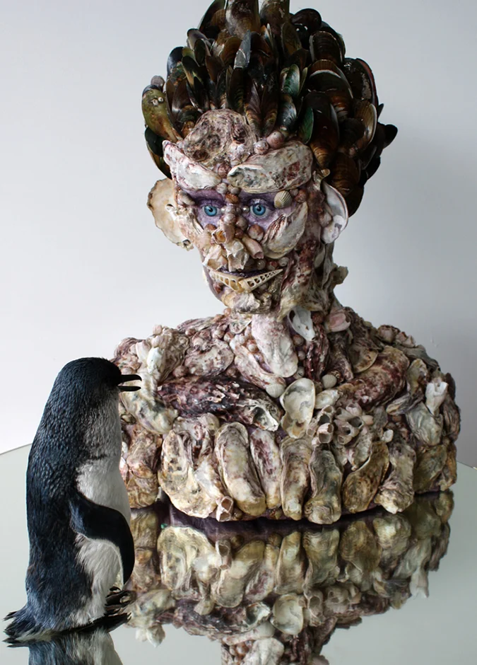  Waterspeaker 2011 Steel stand, mirror, taxidermied penguin, glass eyes, rock   