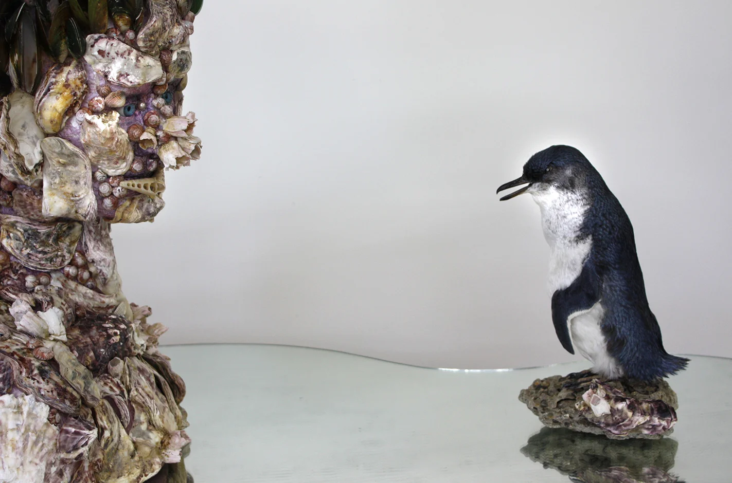Waterspeaker 2011 Steel stand, mirror, taxidermied penguin, glass eyes, rock