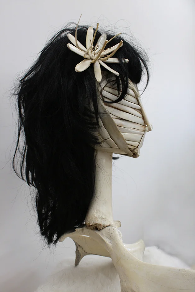  Woman of Bone with Black Wig 2011 Animal bone, nylon wig   
