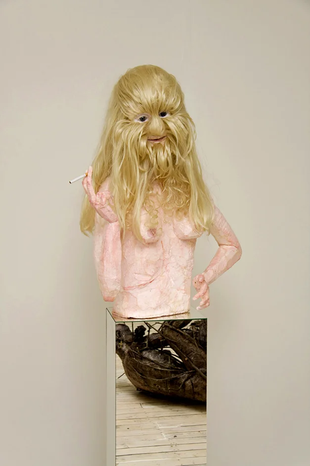 Pearl 2009 Polystyrene, glass eyes, cigarette, paint, wax, mirror, glass,synthetic hair