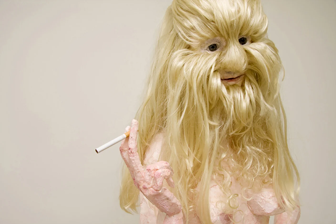 Pearl 2009 Polystyrene, glass eyes, cigarette, paint, wax, mirror, glass,synthetic hair