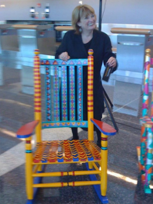 Evelyn with Native Rocker at Logan Airport