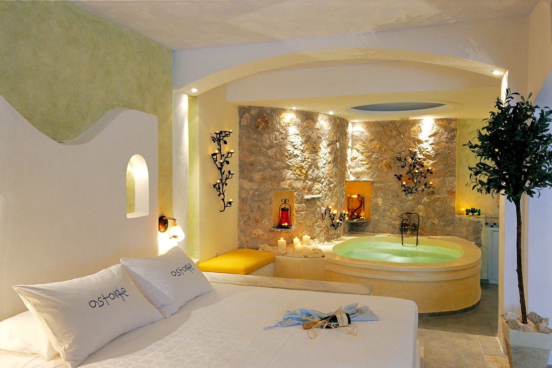 1_Honeymoon_suite_private_couples_Jacuzzi_sea_volcano_caldera_views_Astarte_Suites_Santorini_island.jpg