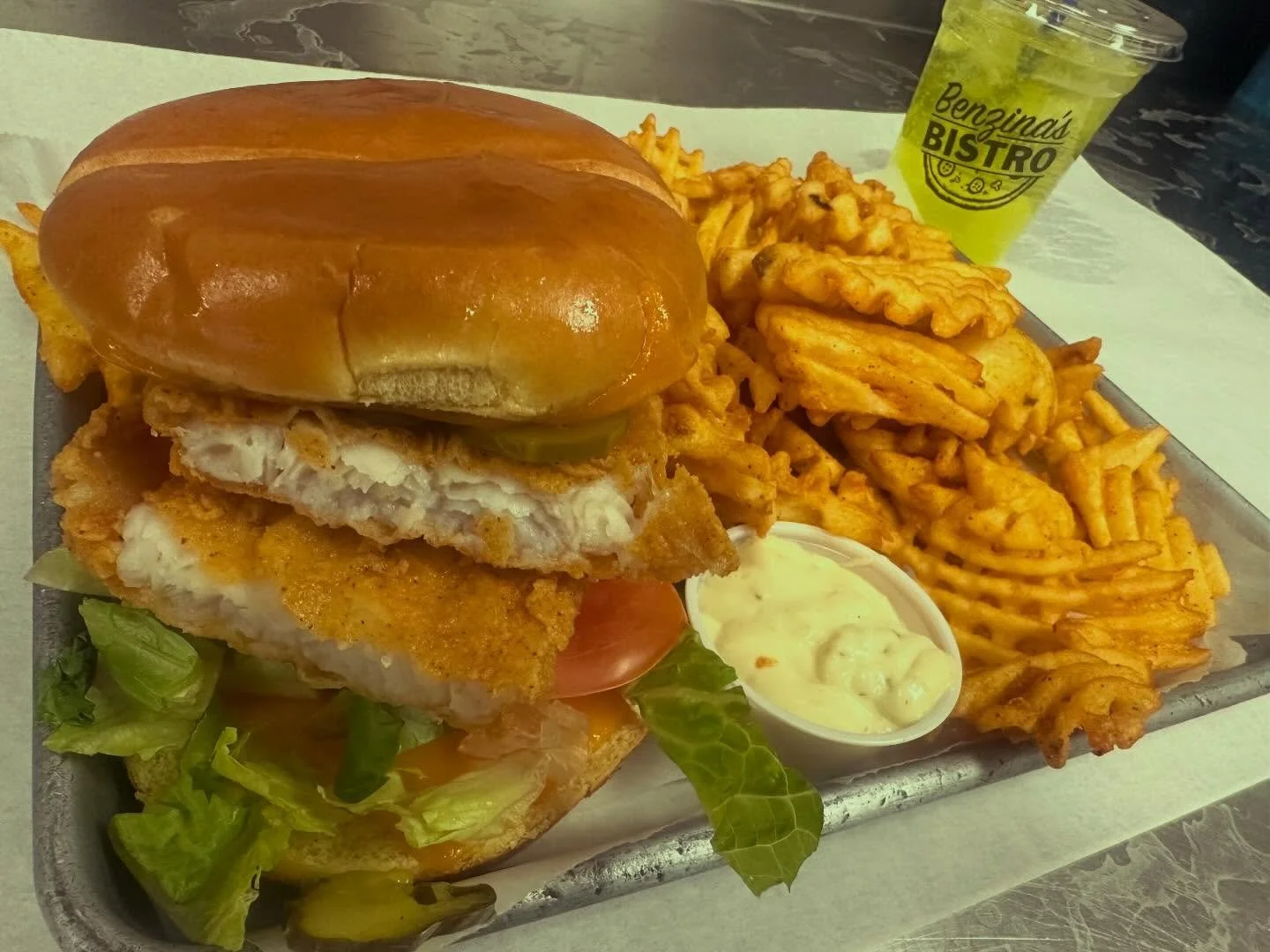 Fish February is back!
One of our most requested favorites has returned &mdash; the Catfish Sandwich Combo 🐟

House-breaded, golden-fried catfish served on a soft brioche bun with tartar sauce, paired with crispy waffle fries and a 16oz fountain pop
