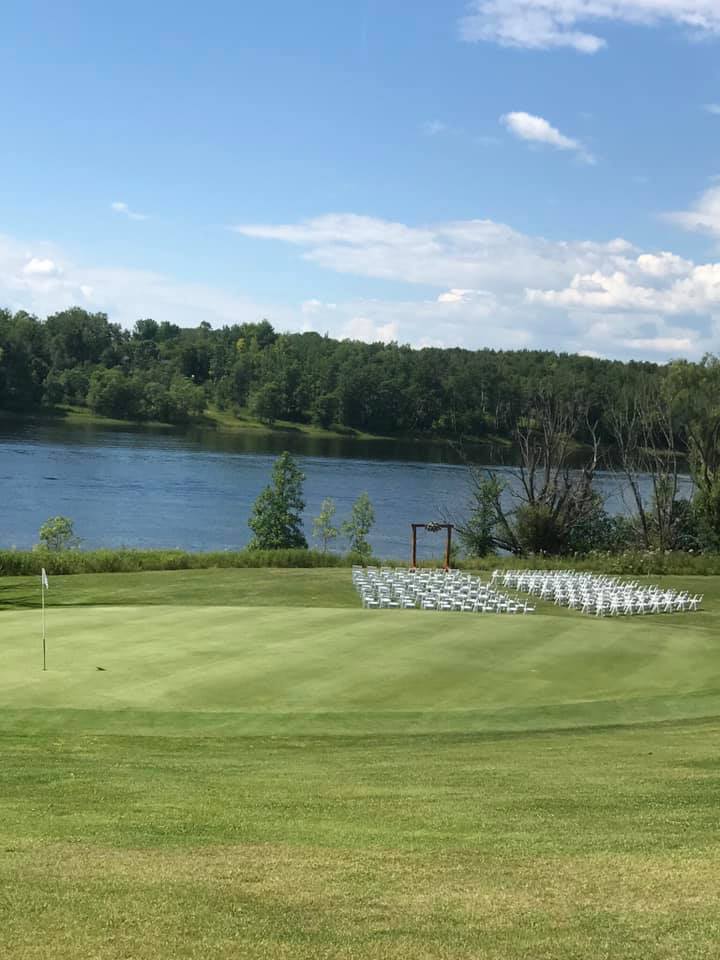 wedding outdoor setup green and chairs.jpg