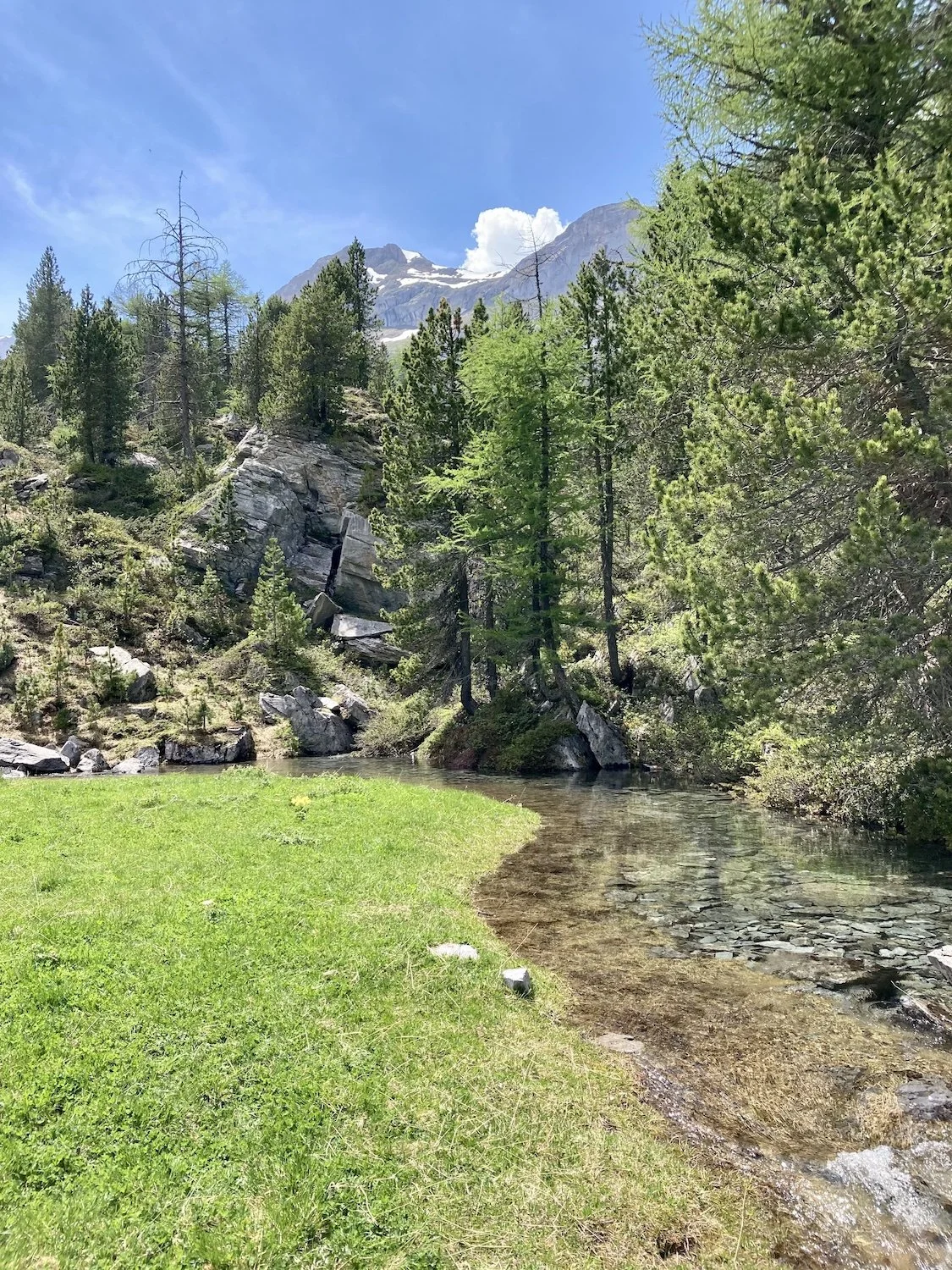 Tent in high mountain terrain along the Bernese Oberland Traverse