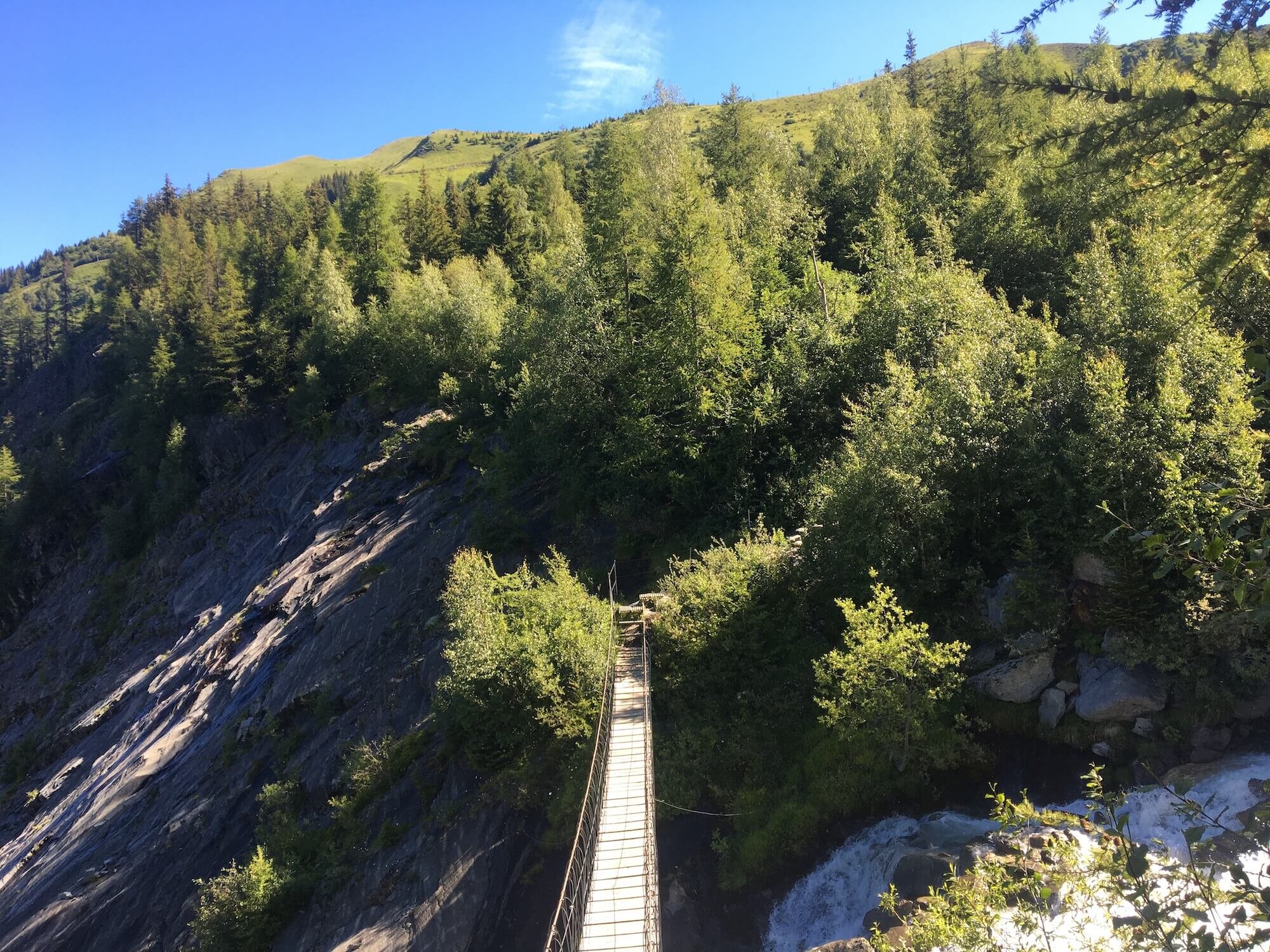 Bridge over Bionnassay glacier runoff