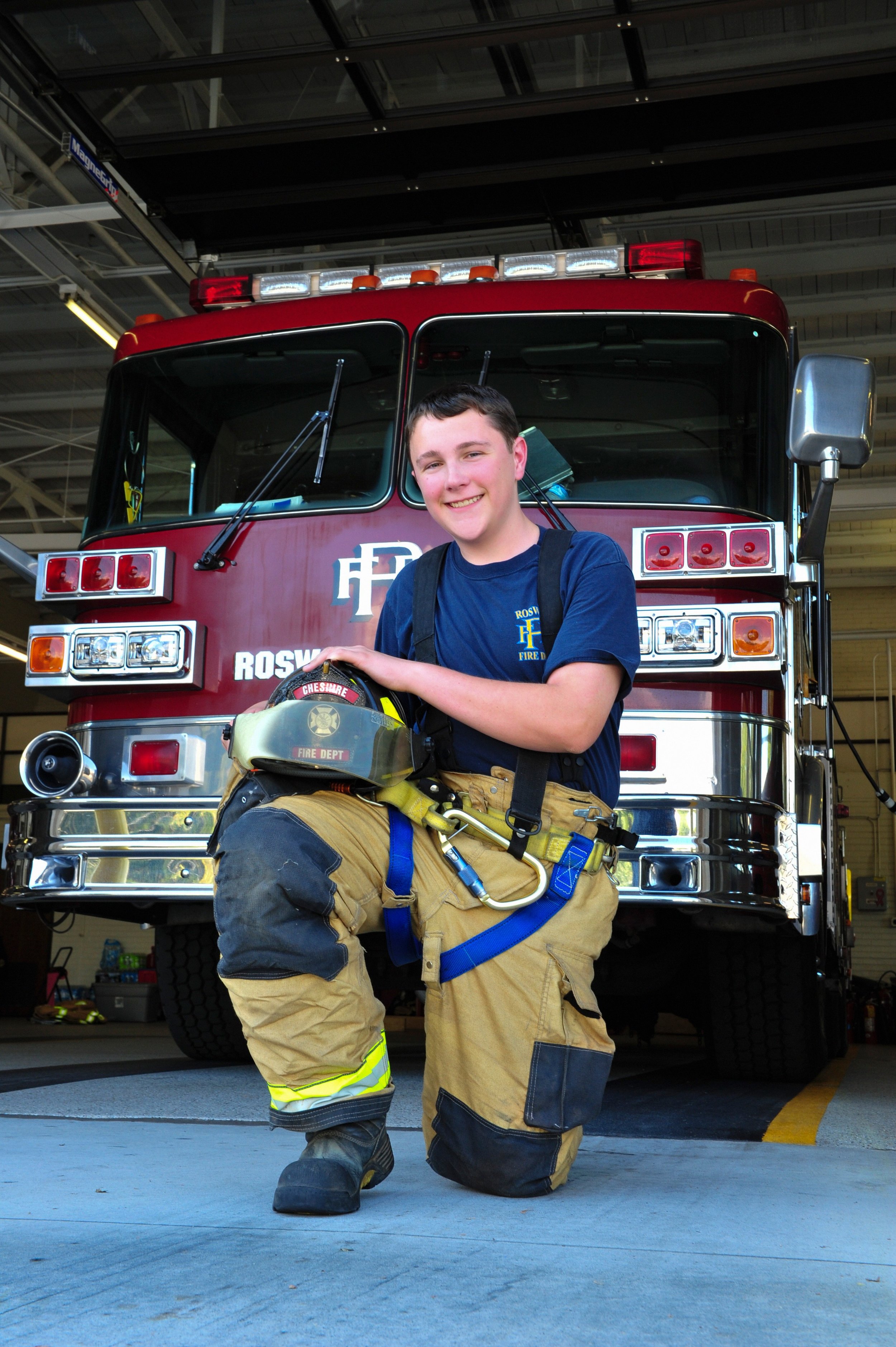 Unique senior photo ideas boy firetruck