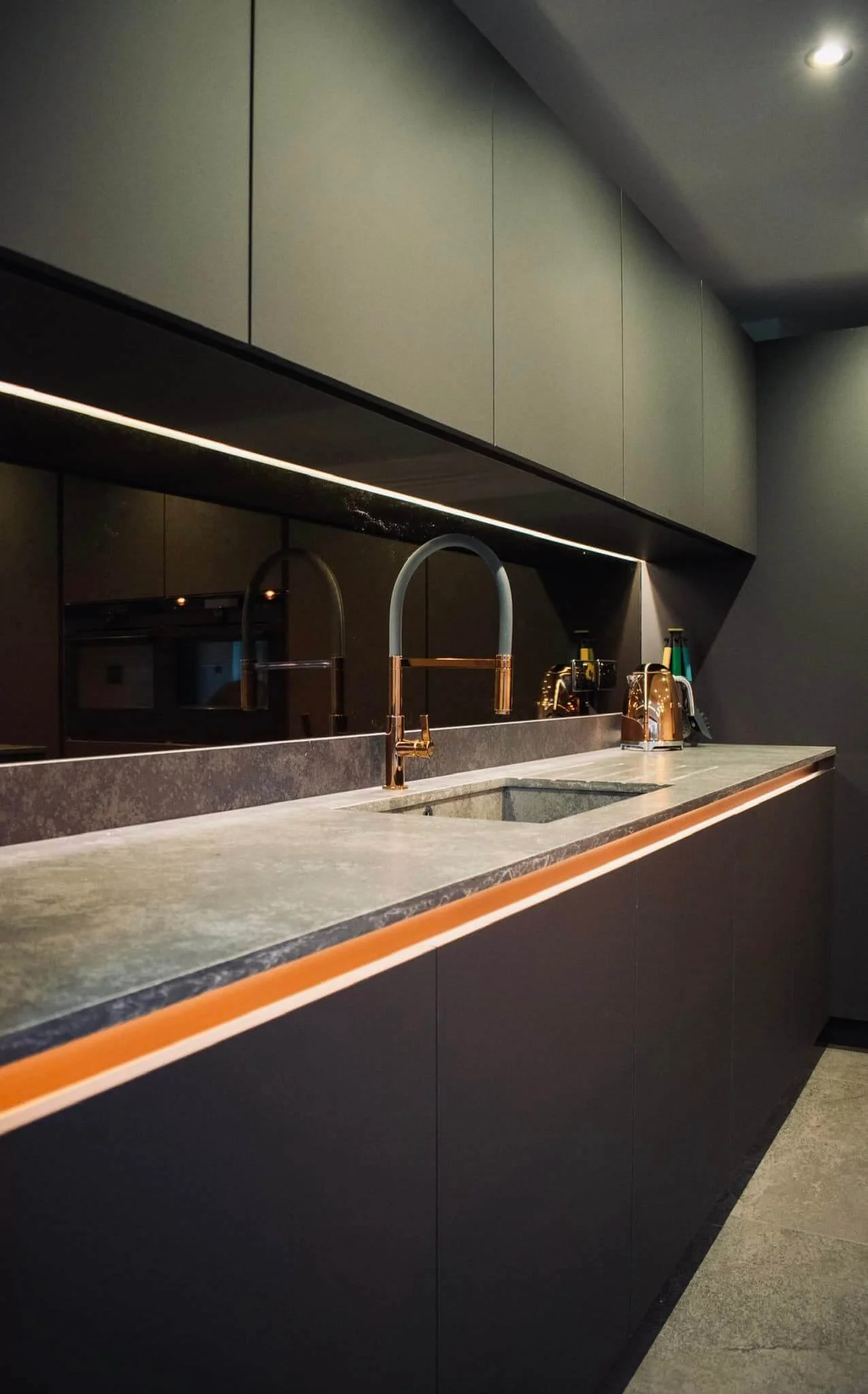 modern-kitchen-sink-area-copper-tap=mirror-splashback.jpg