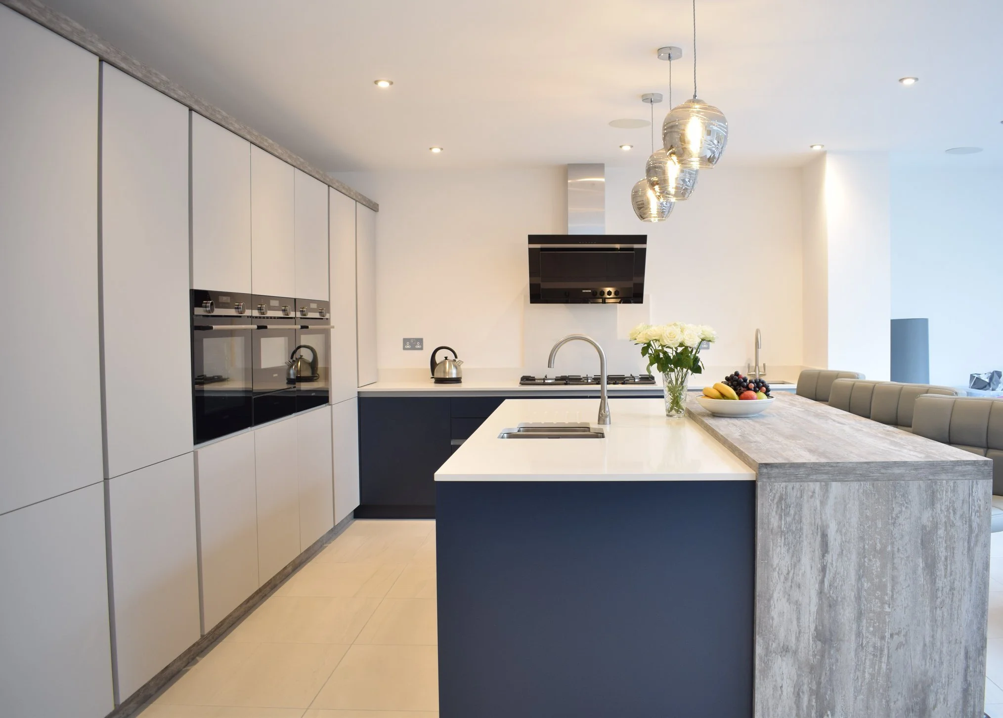 blue-and-grey-german-kitchen-with-large-island.jpg