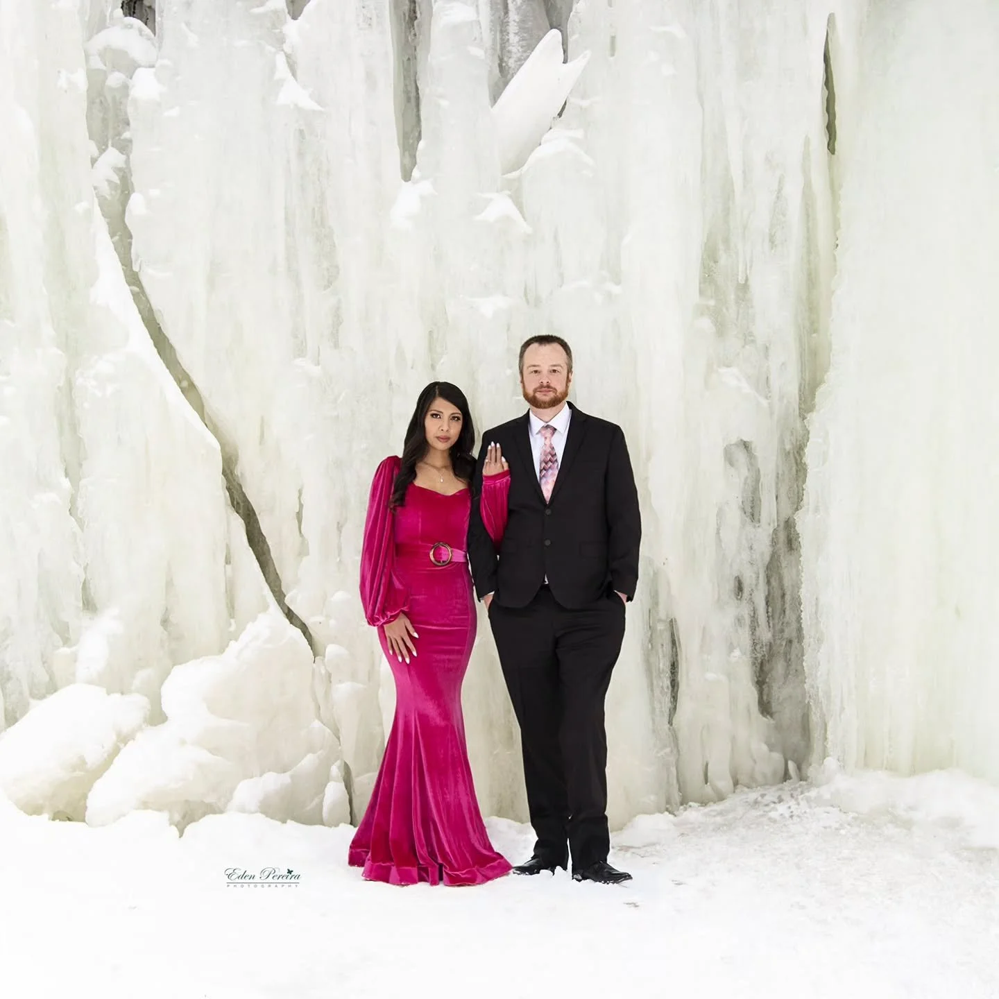Frozen waterfalls, icy air, and a love that refuses to blend into the background ❄️

There&rsquo;s something magical about winter sessions, the quiet, the stillness, the way everything feels untouched and dramatic. And then&hellip; you add a bold gow