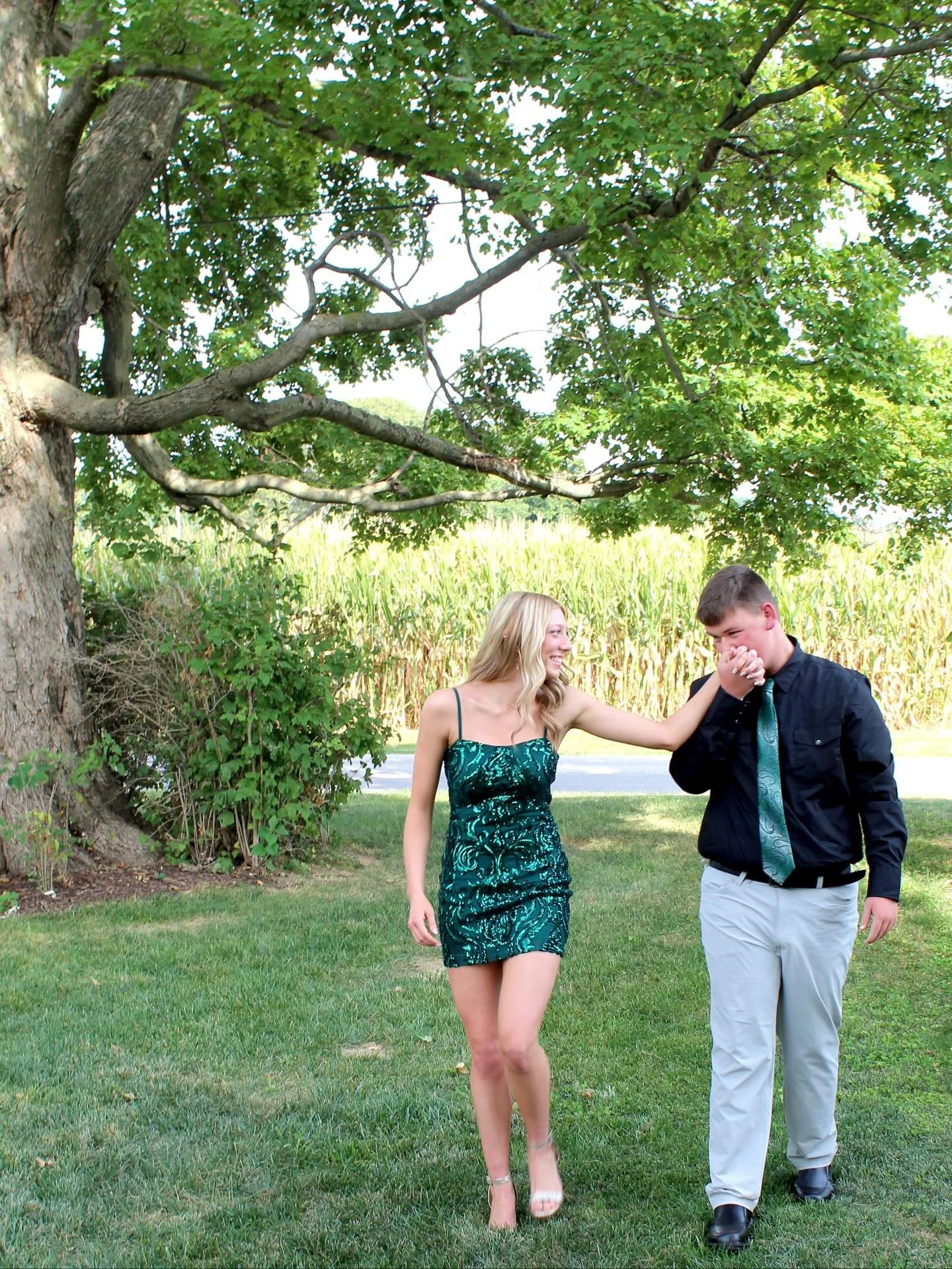 Our beautiful granddaughter and her sweet boyfriend represented their class last Friday night in their homecoming court! Of course we had to come out and get some shots of them at the barns before hoco. How cute are they though?!💚🖤