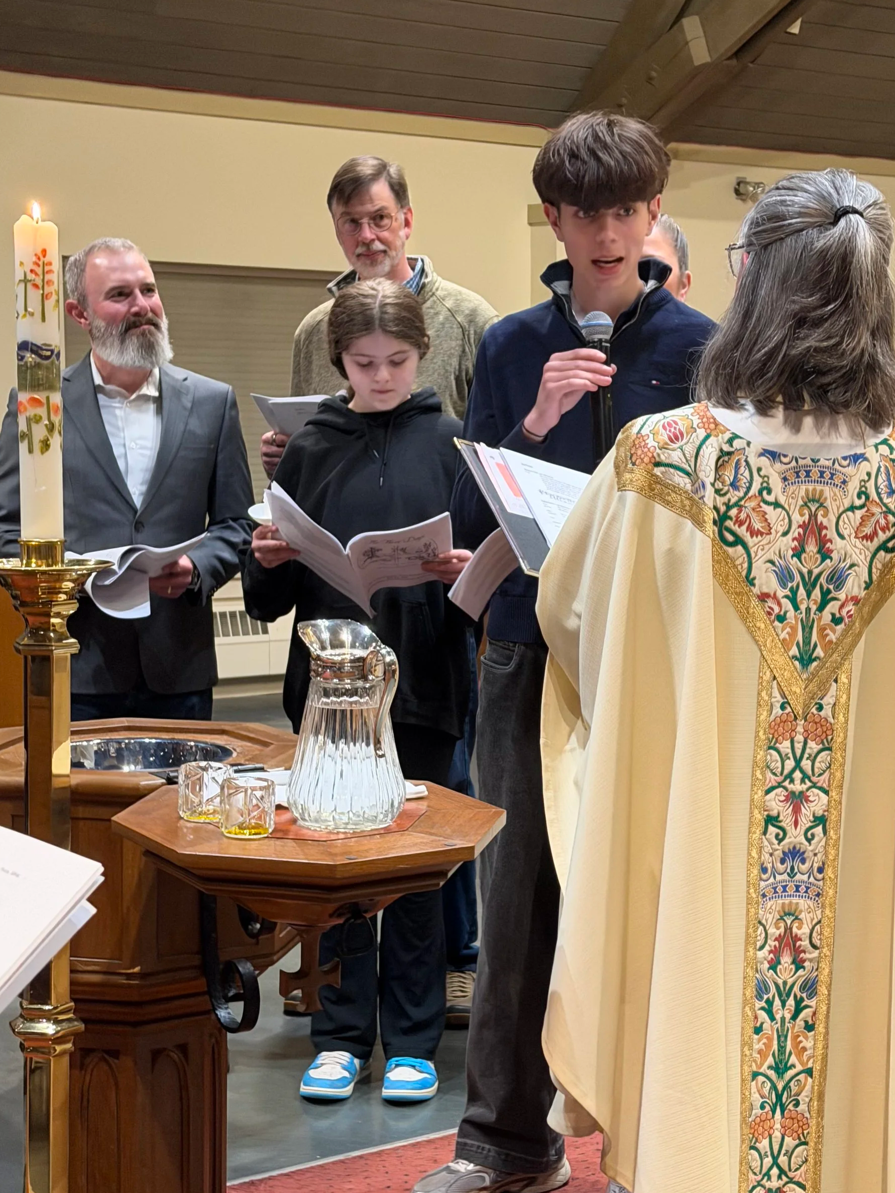Teenage boy at his baptism