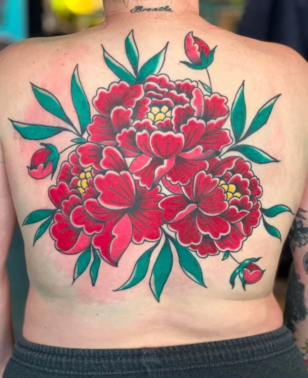 our gal @gabejoyner just wrapped up this biig ol' beautiful floral back piece 🌹🌹would you JUST LOOK AT IT?! 😍
