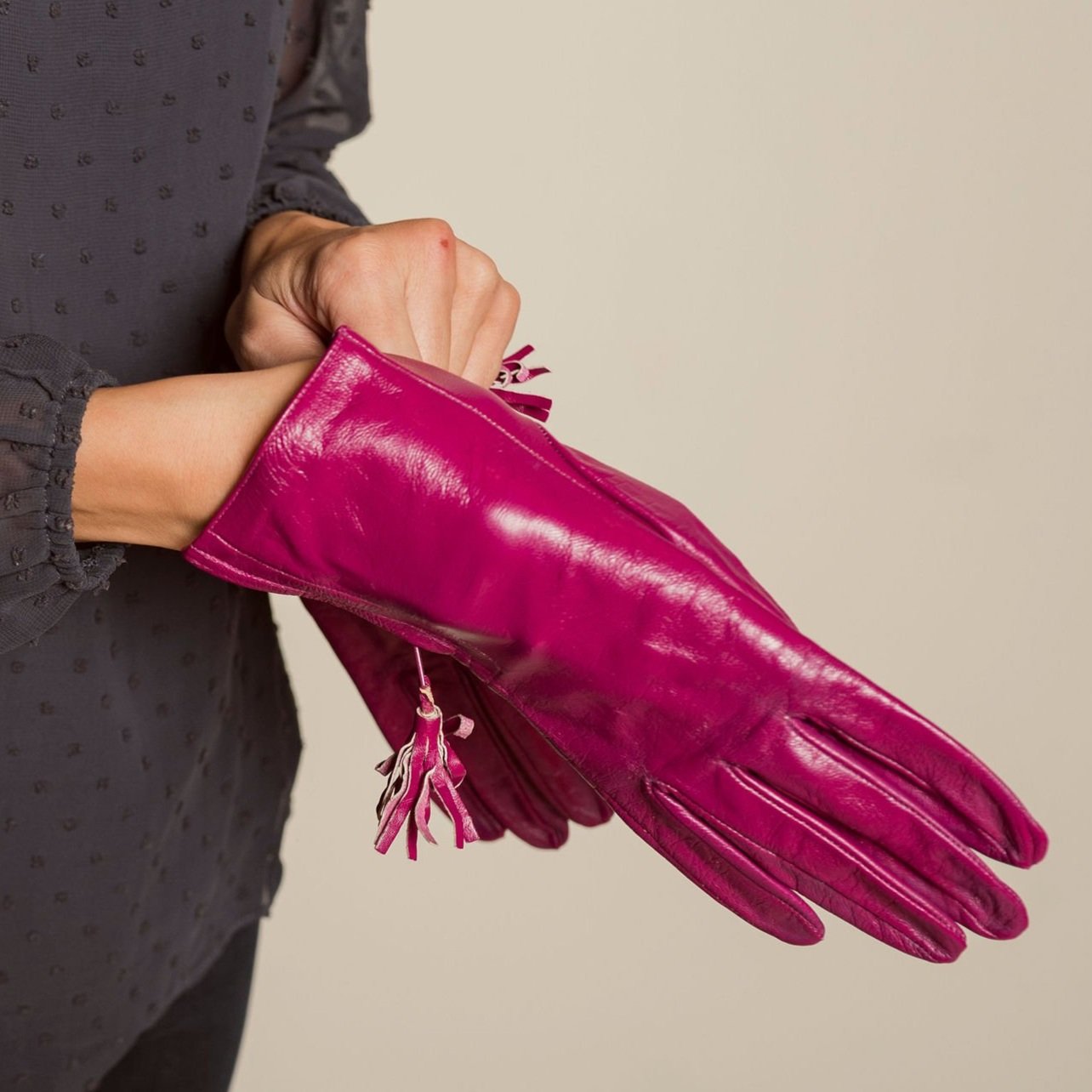 Pink leather gloves.