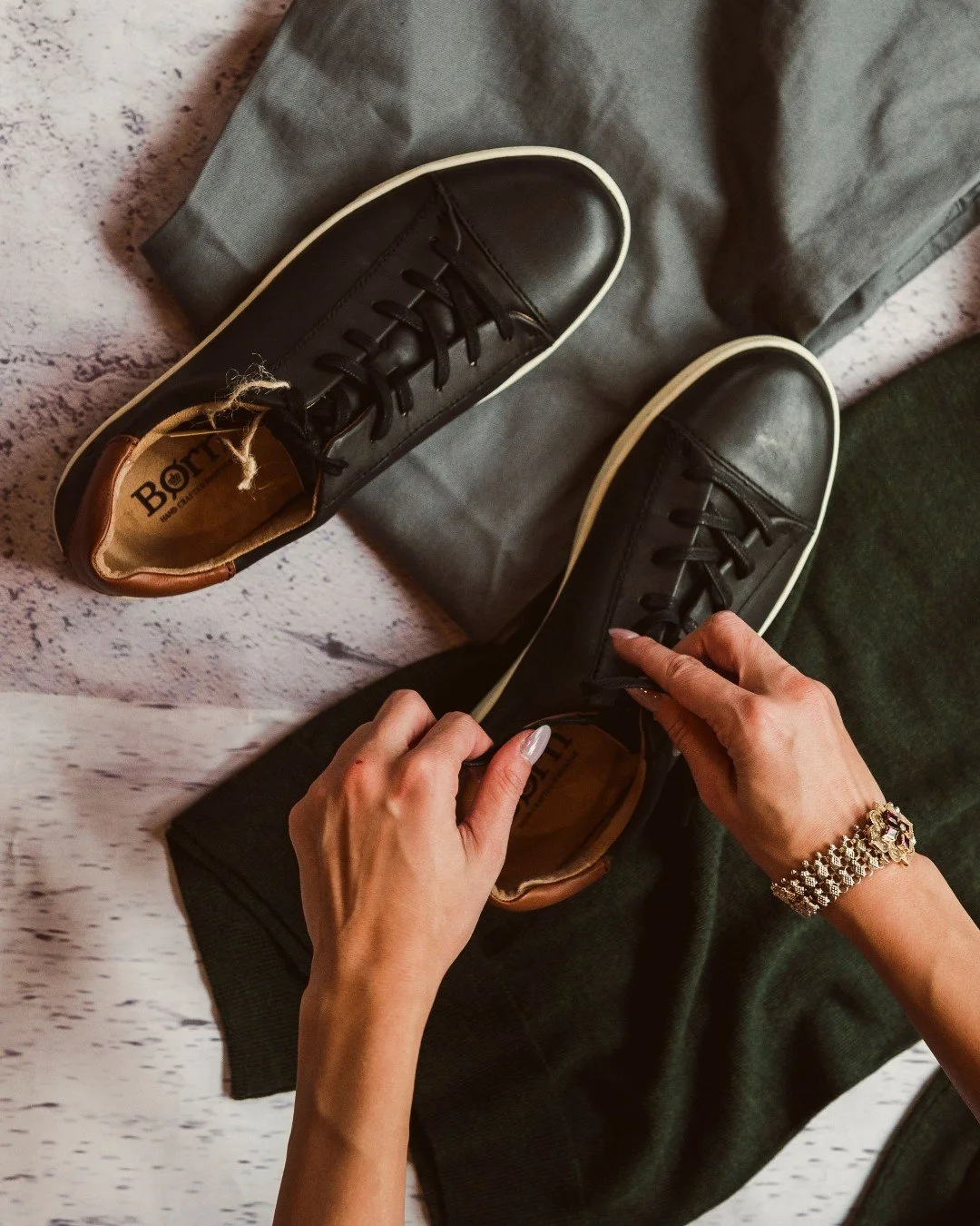 The season&rsquo;s biggest shift? It&rsquo;s in the details. 👞 Swap heavy boots for sleek sneakers or vice versa &mdash; let your shoes reflect how you want to move through the week.