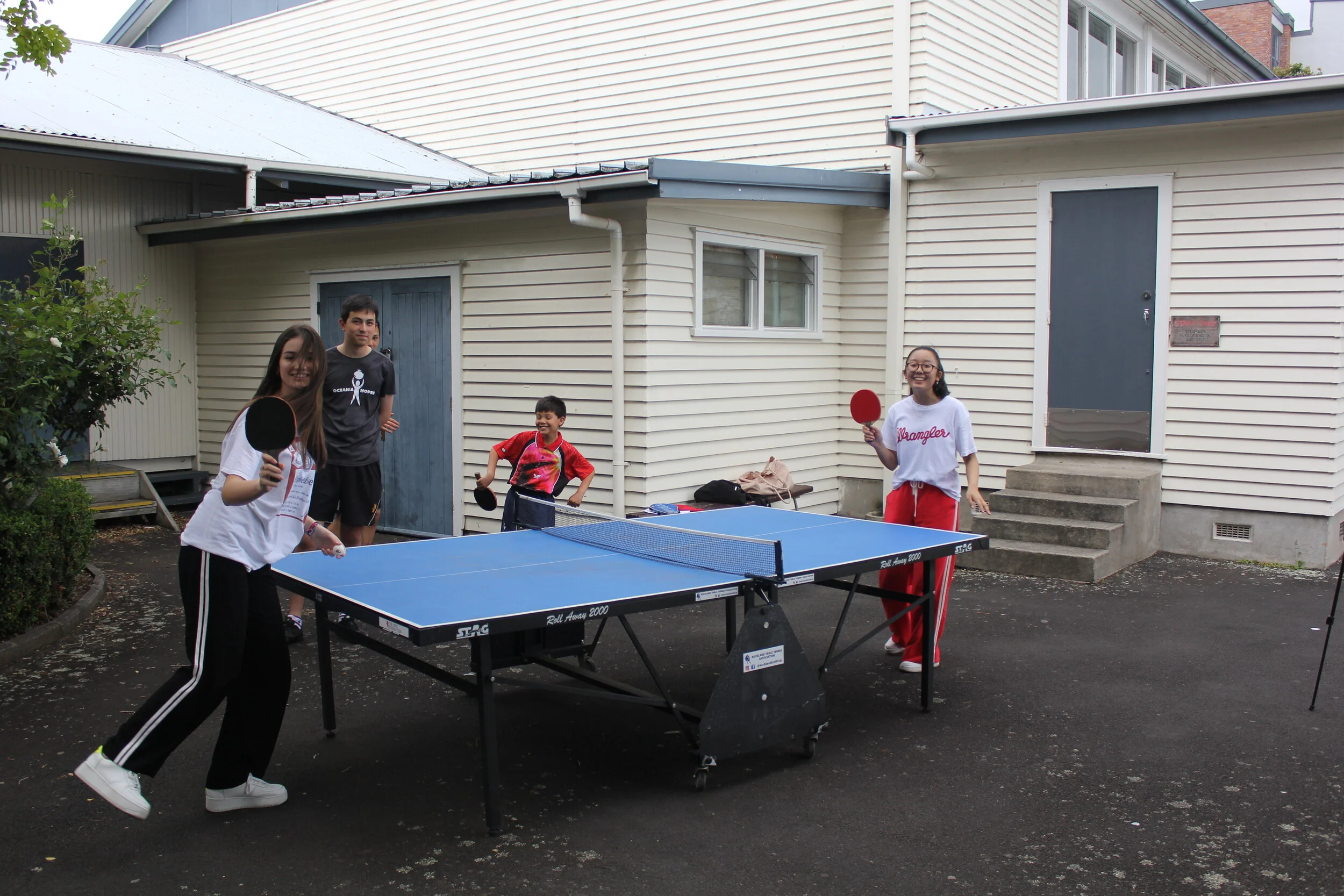 Epsom Girls Grammar School students enjoying playing table tennis at their local venue