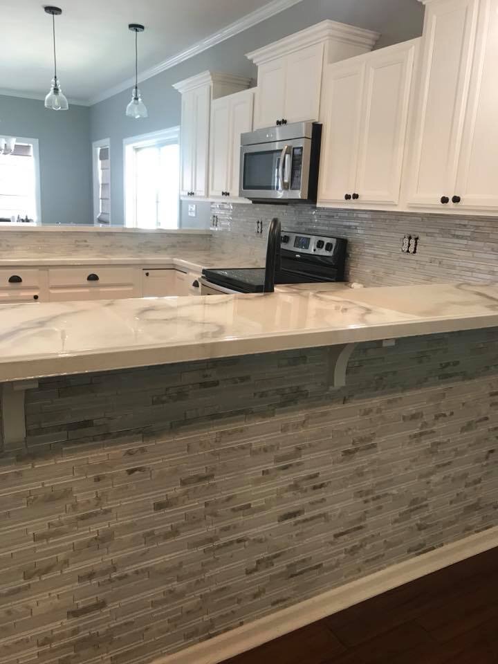 White & Grey Glass Backsplash with Metallic Epoxy Countertops.jpg