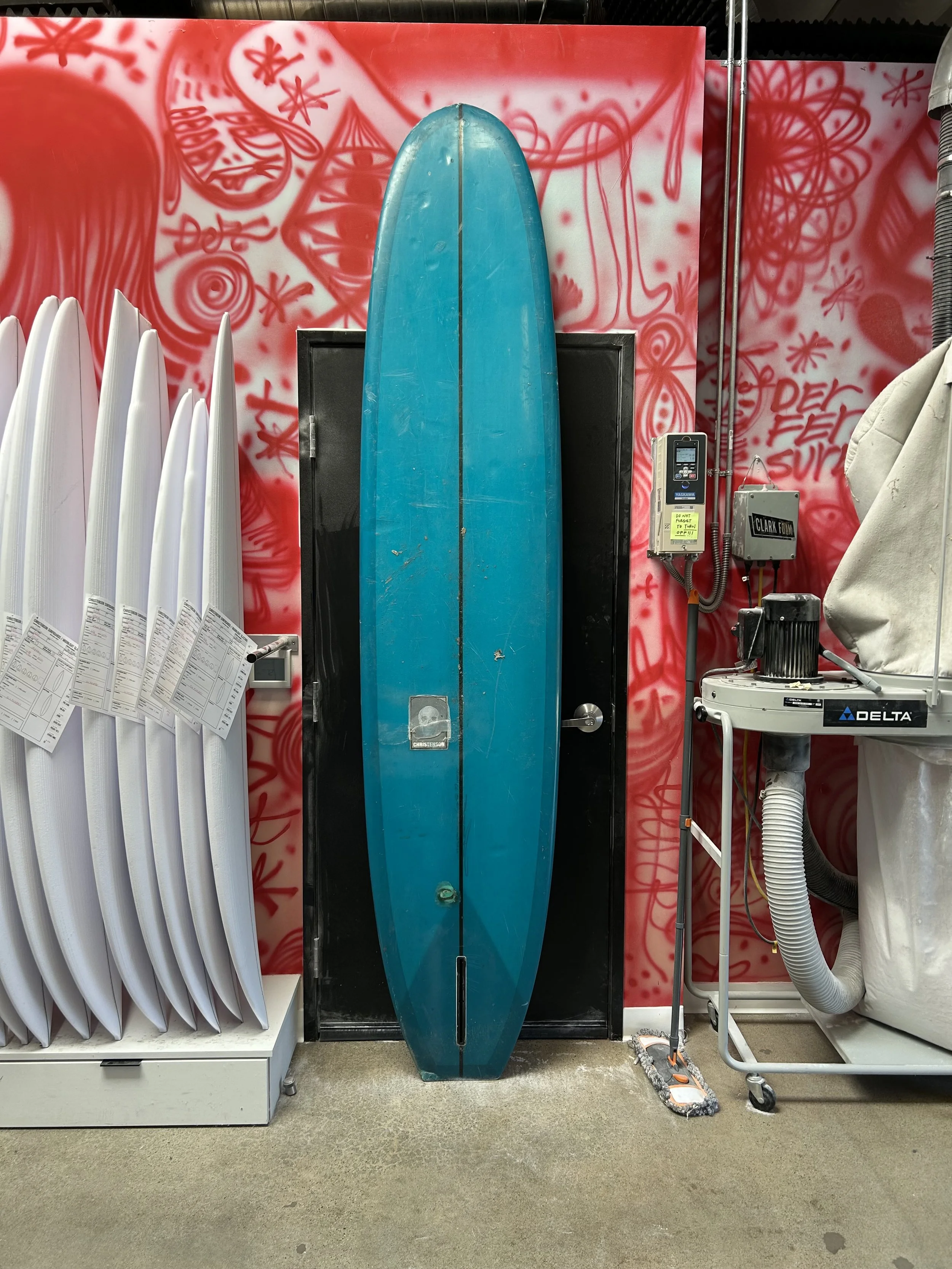 used blue surfboard bottom
