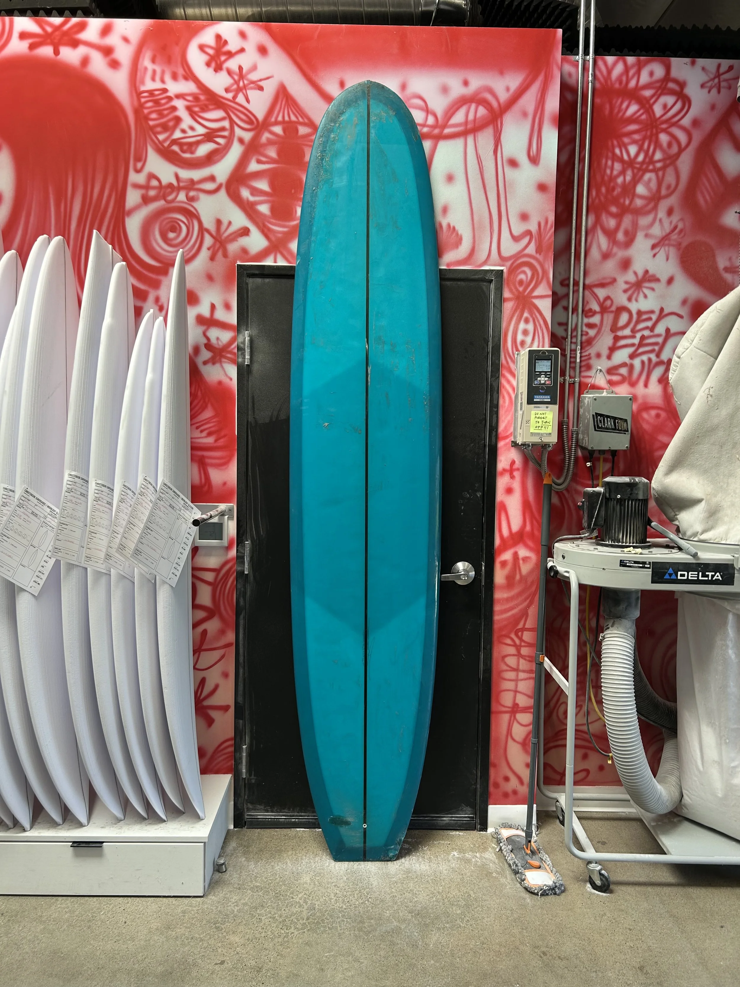 blue used surfboard top