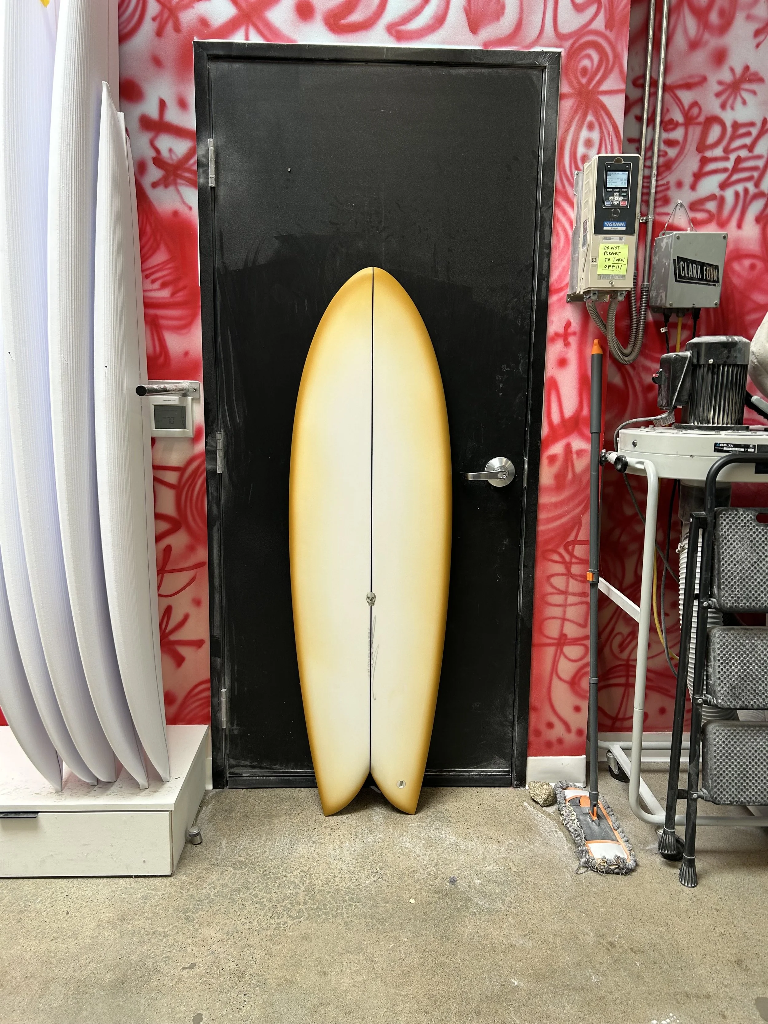 myconaut on black door top of board