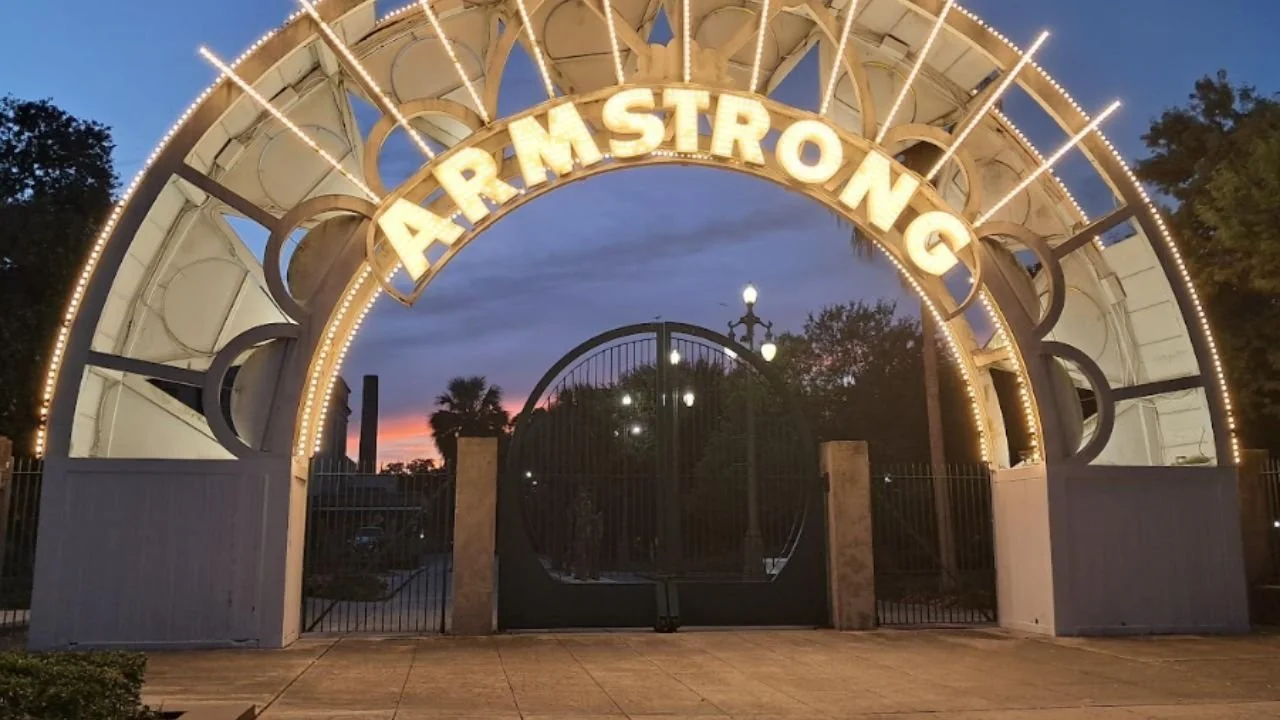 the iconic entrance archway of Louis Armstrong Park, that honors the legendary jazz trumpeter and singer Louis Armstrong.