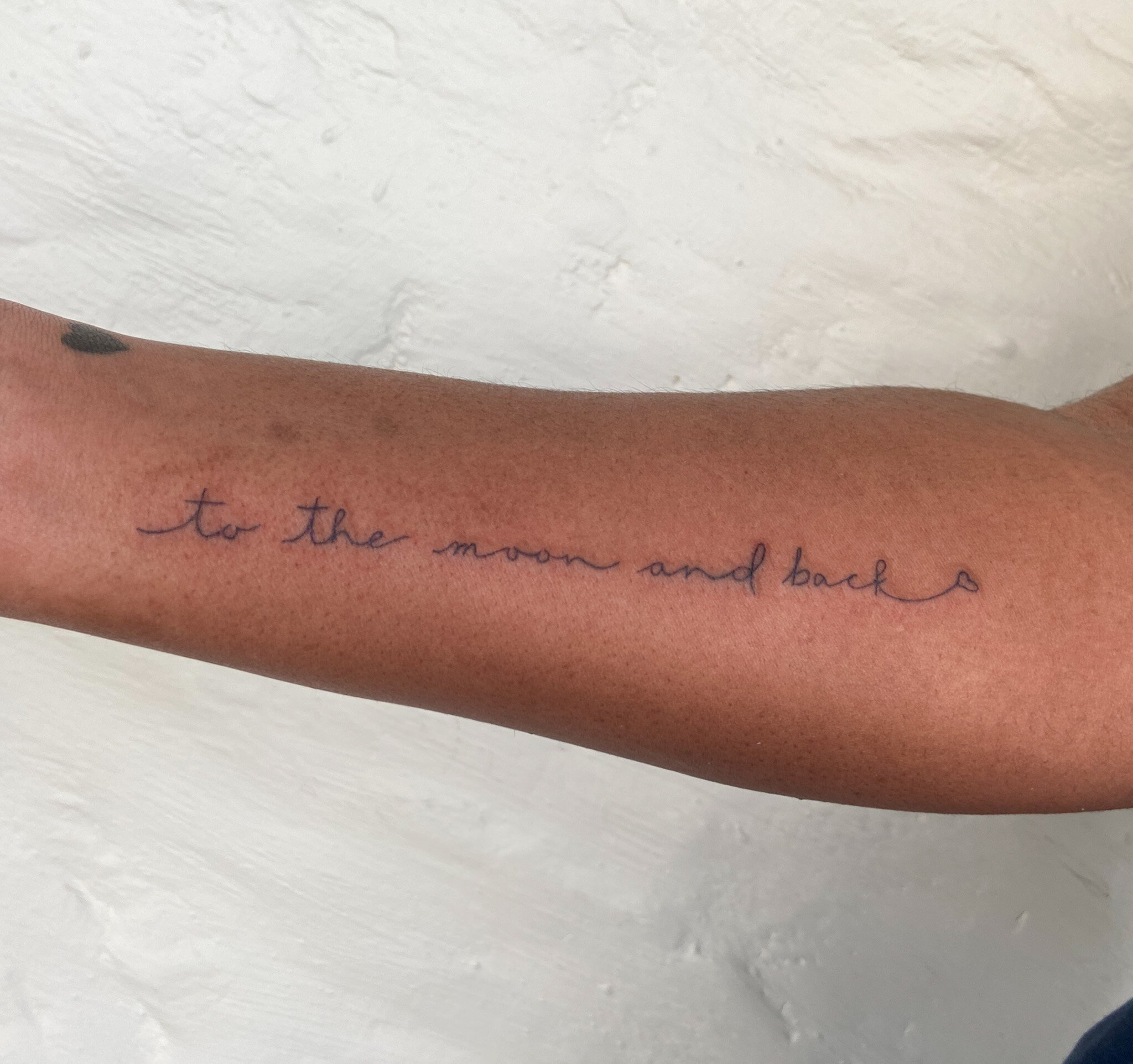  "to the moon and back" think cursive script 