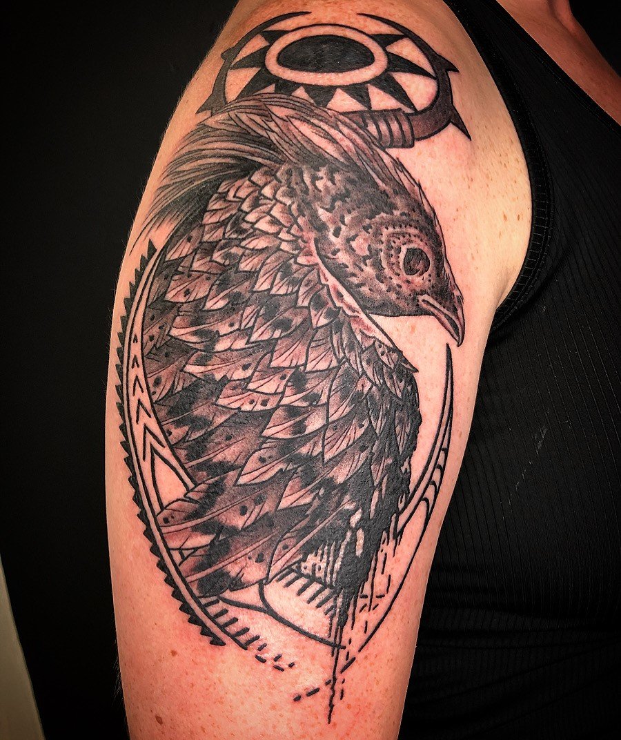 Tribal black and grey bird tattoo.jpg