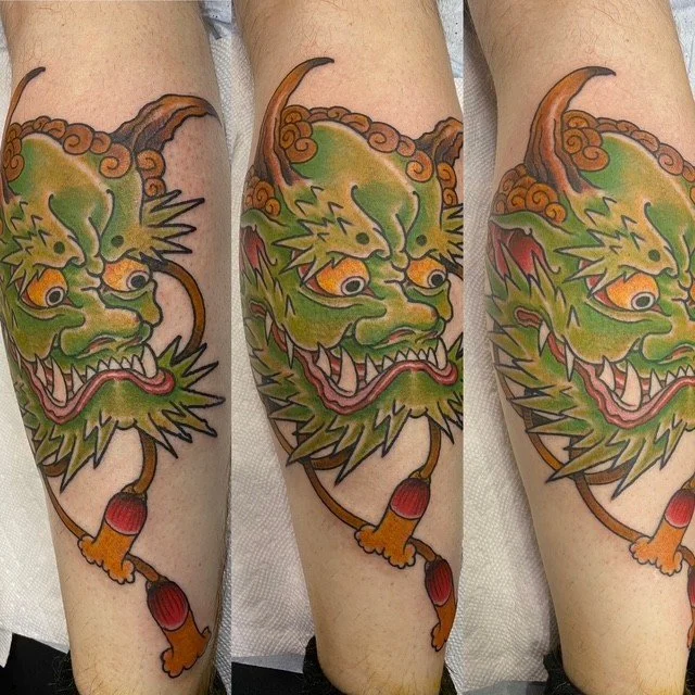 green dragon head tattoo.jpg