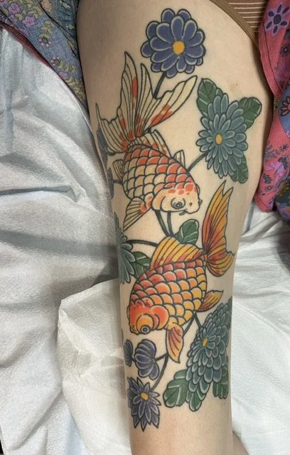 two fish tattoo.jpg
