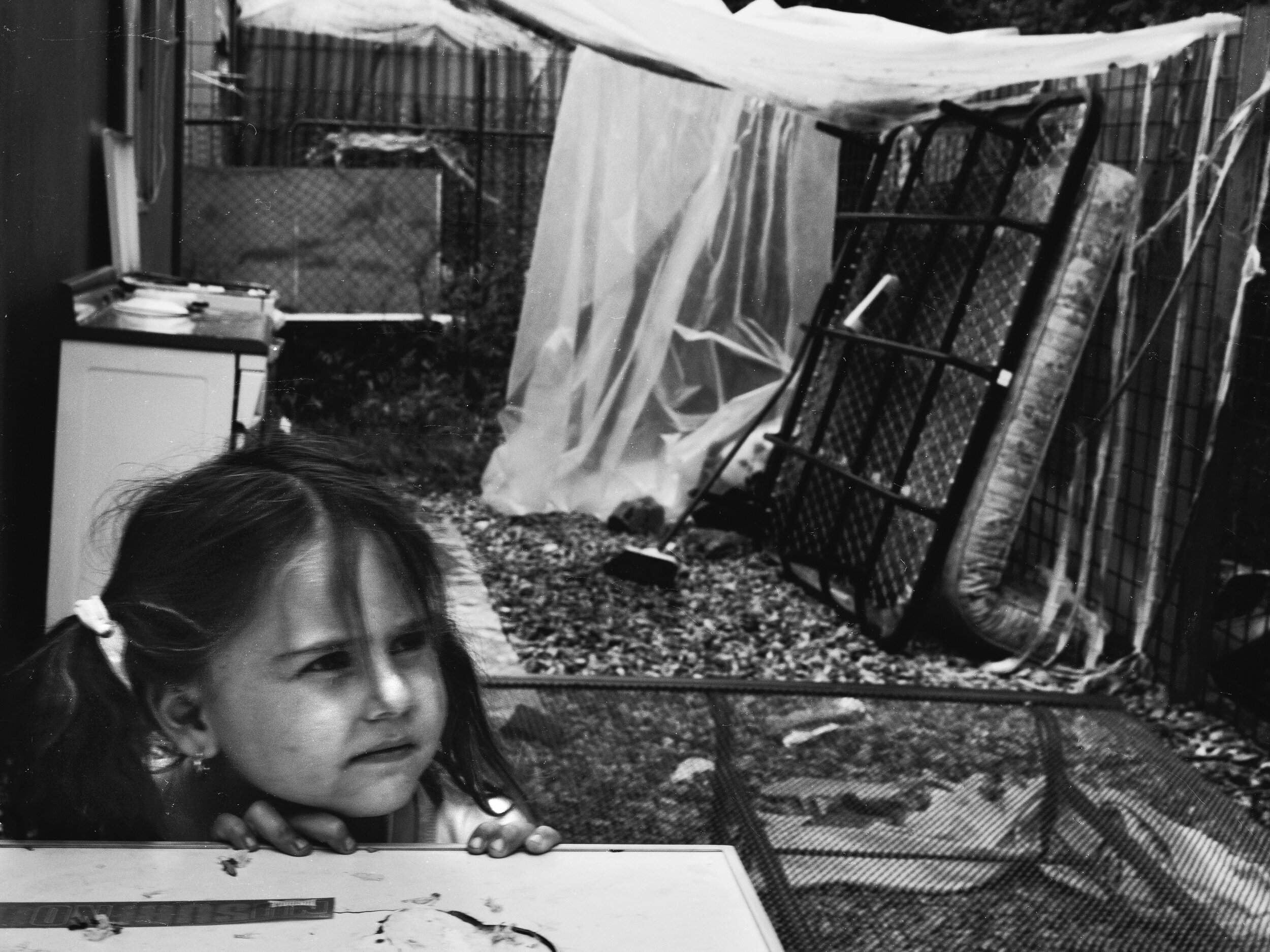  Rome, Italy  Roma child in her family’s camp. 