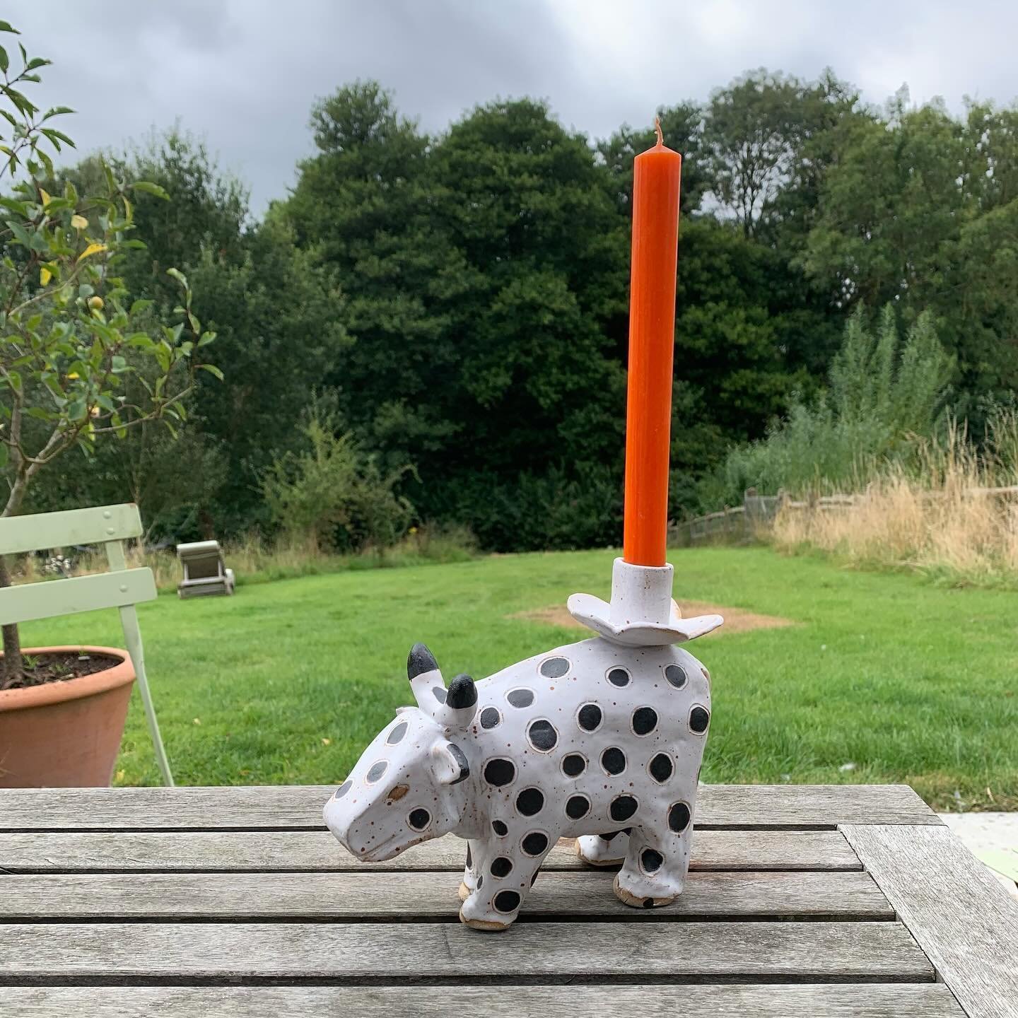 Ooh I enjoyed opening the kiln this morning and finding the cow candleholder pretty much how I expected it to be and that  the sheep created with the wax resist gold sharpie had worked. One of the difficulties with making ceramics is that often our e