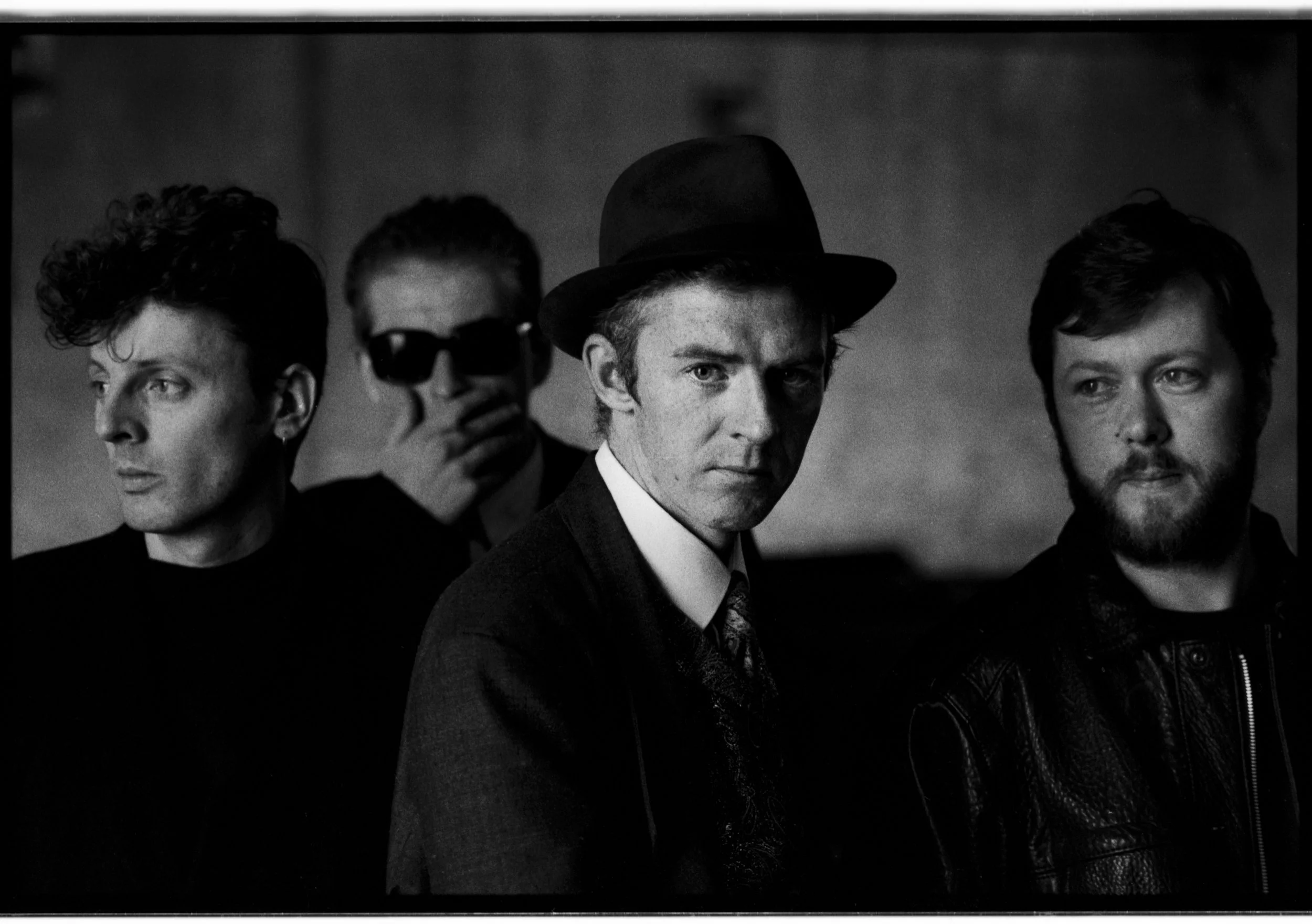 The Radiators photographed in the Dublin docklands in 1989. L-R Pete Holidai, Mark Megaray, Philip Chevron and Jimmy Crashe.