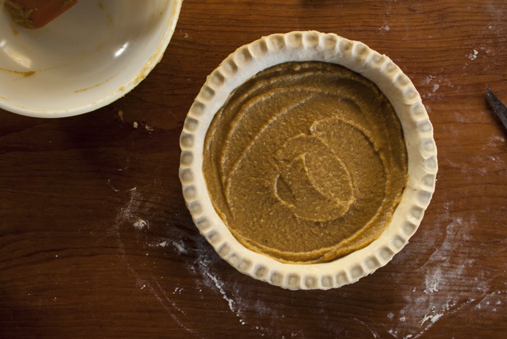 First we bake the pie with only the squash filling, then add the streusel and bake a few more minutes.