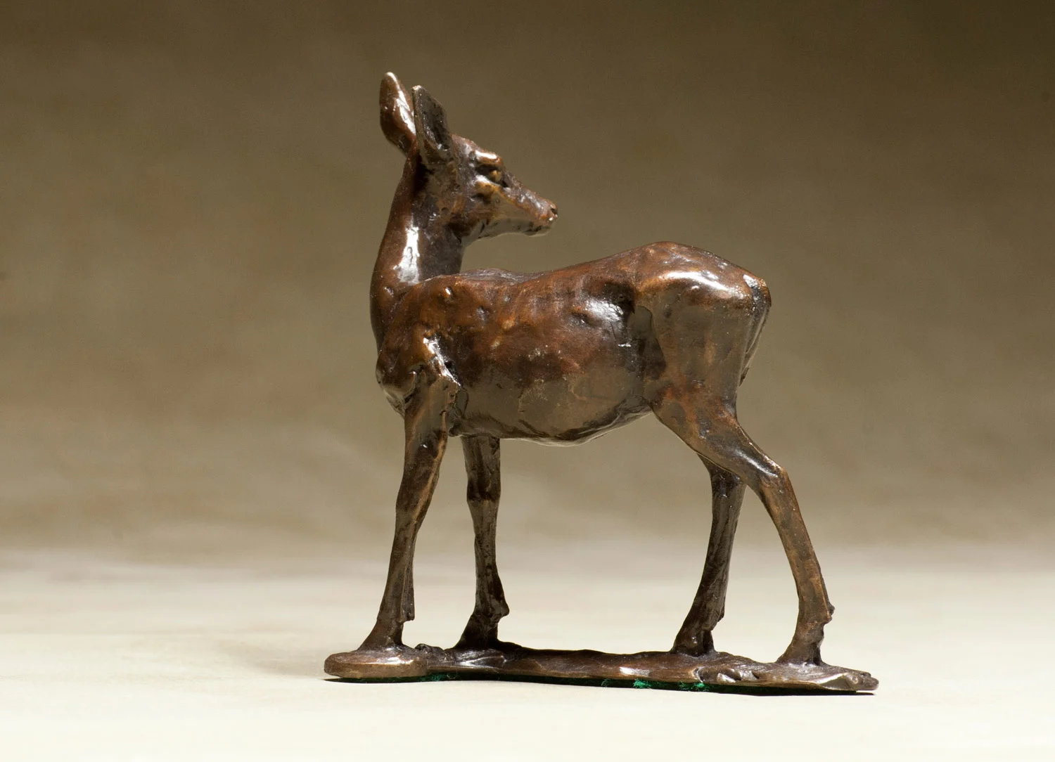 gillick-standing-red-deer-calf-yearling-small-bronze-sculpture-head-right-behind-web.jpg