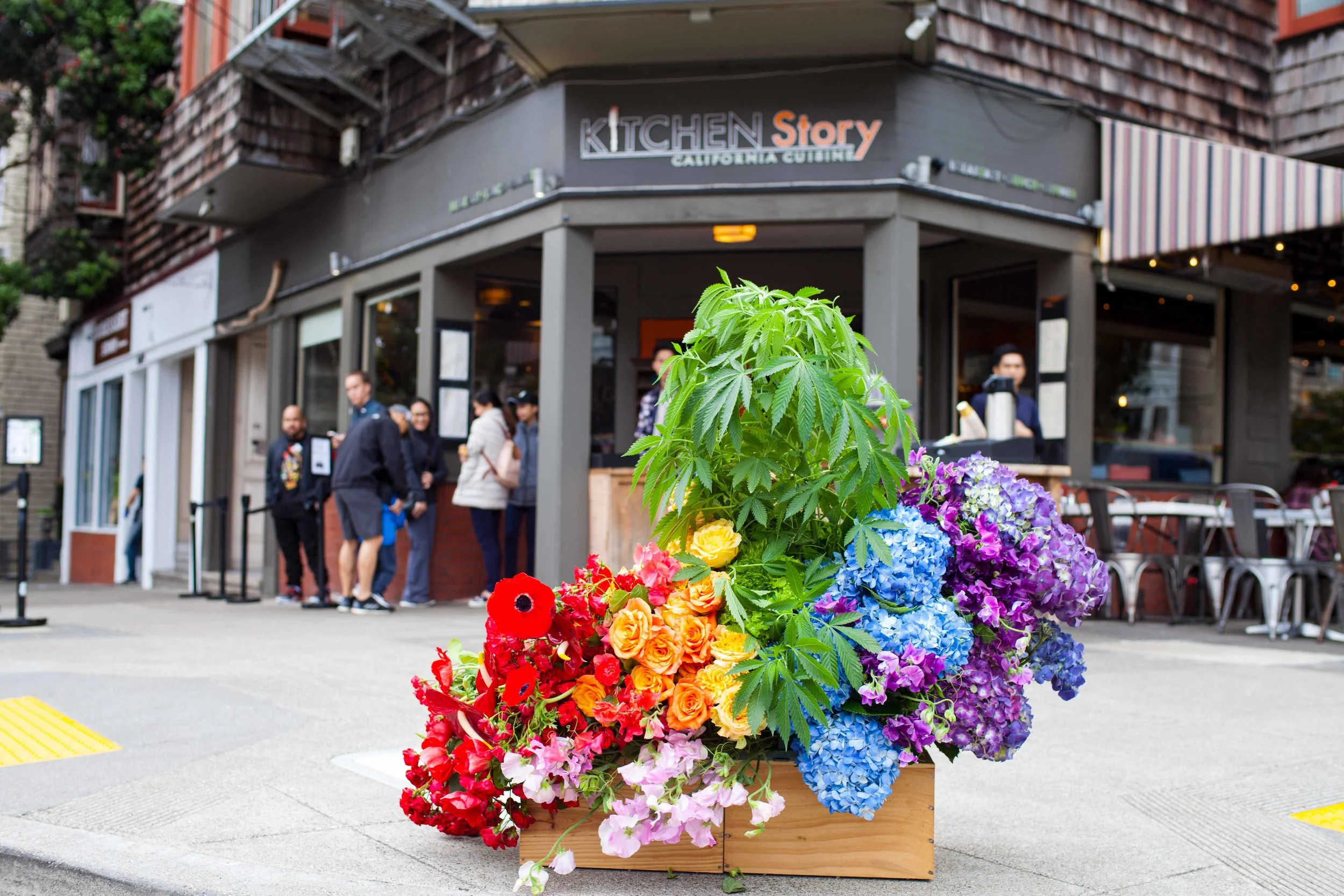 The bouquet in front of 3499 16th St., former home of The Island and the Big Top Pot Supermarket.