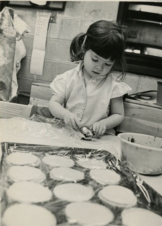 Young Girl making Hamentaschen at JCC