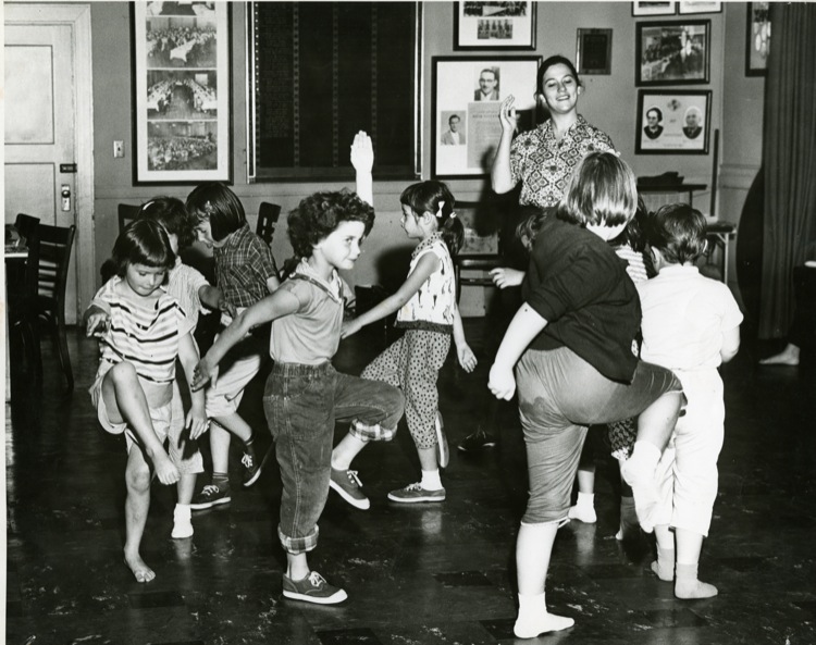 Linda Gordon with a dance class of six-year old girls